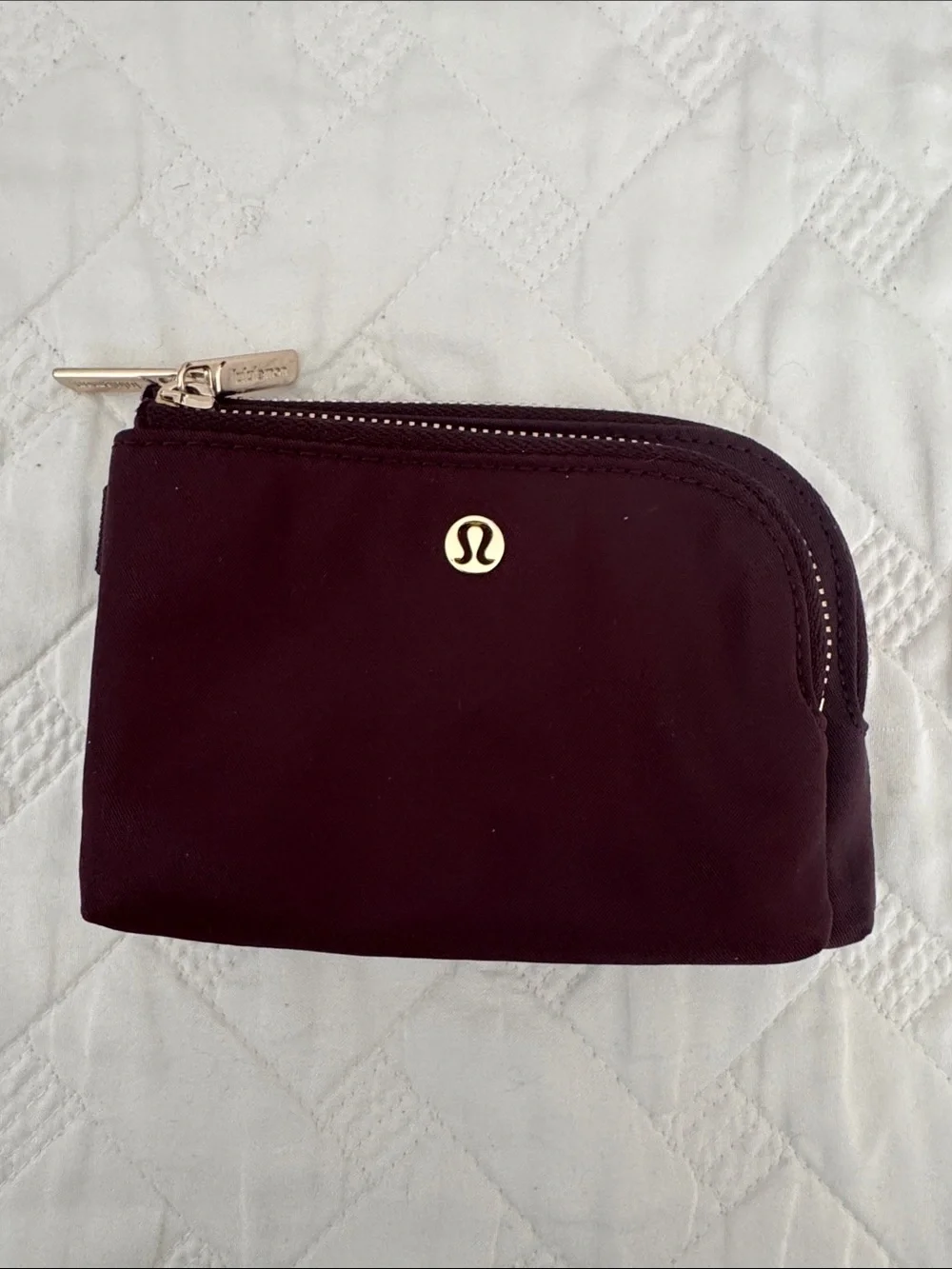 lululemon athletica burgundy key & card holder with gold logo